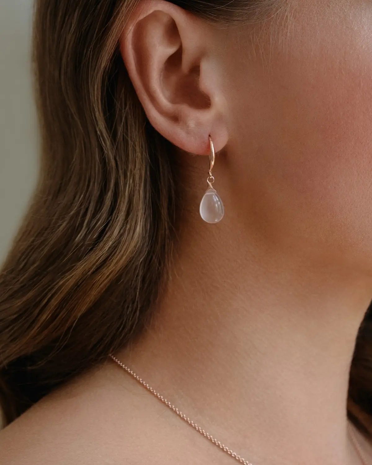 Zarte Ohrhänger aus 925 Sterling Silber mit tropenförmigem Rosenquarz-Natursteinanhänger, Sternenauge